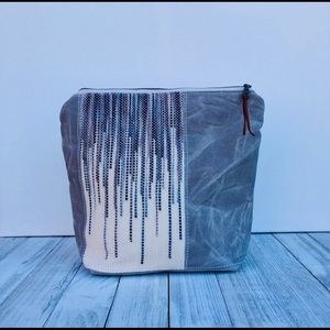 Handwoven and waxed canvas bags